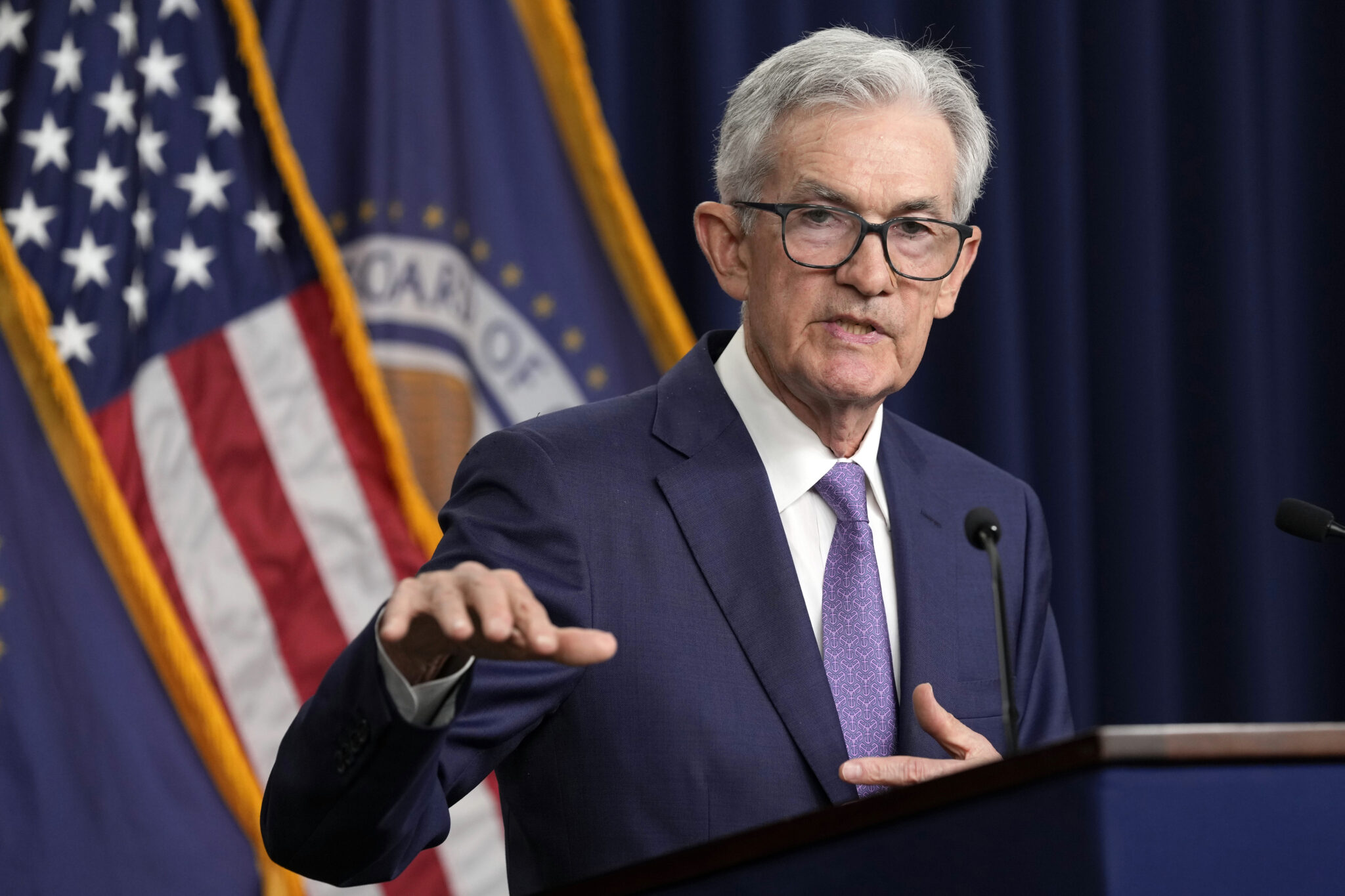 Federal Reserve cuts its key interest rate by a quarterpoint amid